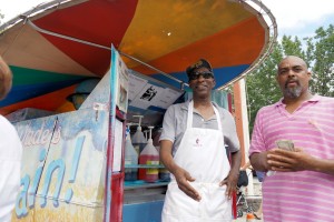 Wade McDaniels, the Snow Cone Man, brings cool treats and cheer to the Riverton Parade.