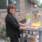 Donna Maratea, Director of Activities and part-time popcorn vendor